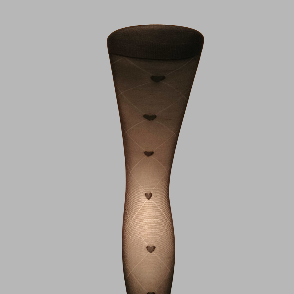 Collant voile avec motifs losanges et cœurs